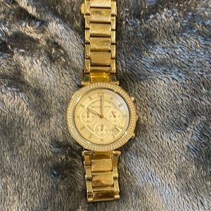 Gold Michael Kors watch rhinestone around face shoes date